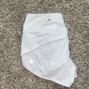 White Lululemon Speed Up Shorts. Size 2 length 2.5. Worn only a few times.